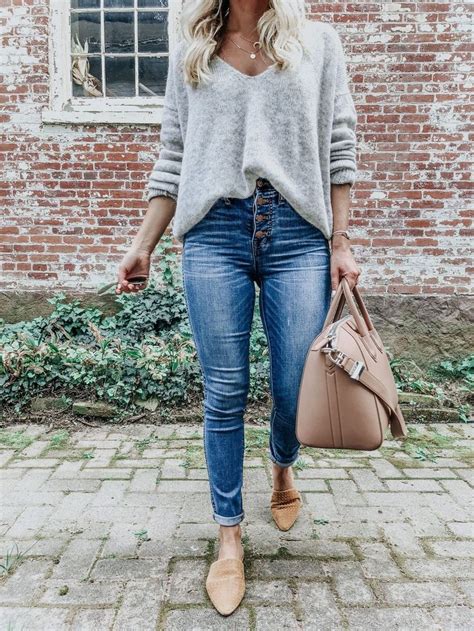 sweater tucked into jeans.